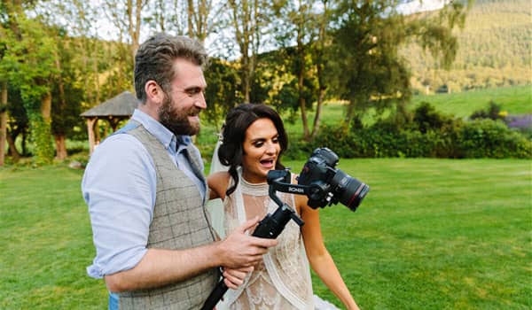 Mathew Lloyd speaking to bride